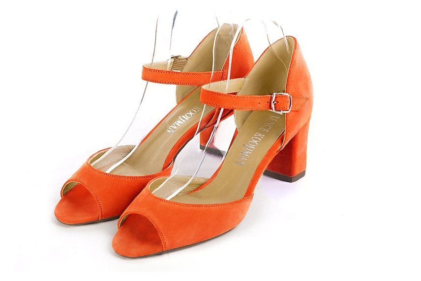 French elegance and refinement for these clementine orange closed back dress sandals, with an instep strap, 
                available in many subtle leather and colour combinations. Practical and elegant, this pretty sandal will be perfect for any occasion.
To be adapted to your needs and desires.  
                Matching clutches for parties, ceremonies and weddings.   
                You can customize these sandals to perfectly match your tastes or needs, and have a unique model.  
                Choice of leathers, colours, knots and heels. 
                Wide range of materials and shades carefully chosen.  
                Rich collection of flat, low, mid and high heels.  
                Small and large shoe sizes - Florence KOOIJMAN